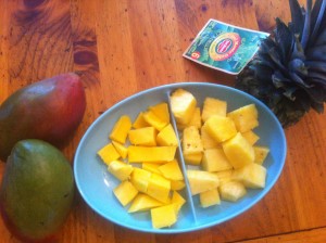 Fresh mango and pineapple, peeled, cored and cubed